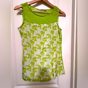 Beautiful Sleeveless floral top with transparent back.